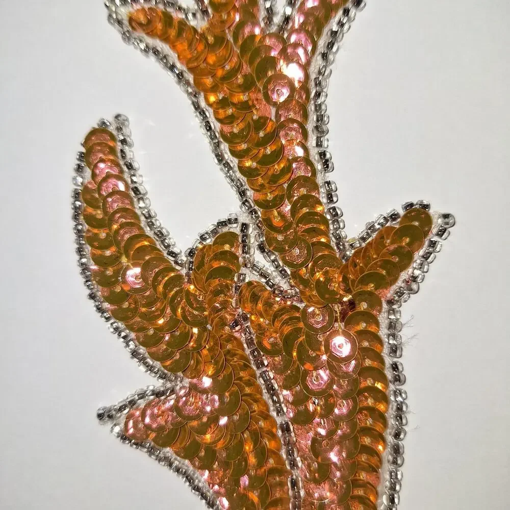 Iridescent orange sequin applique pair leaf design NWOT